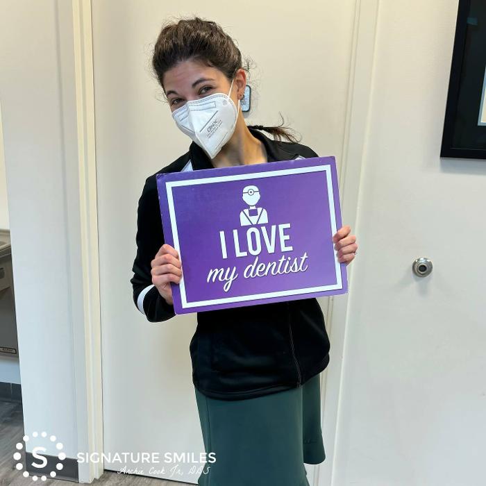 a happy patient at signature smiles in cary nc