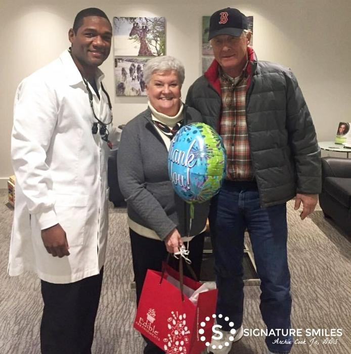 Dr. Archie Cook with two happy patients in Cary, NC