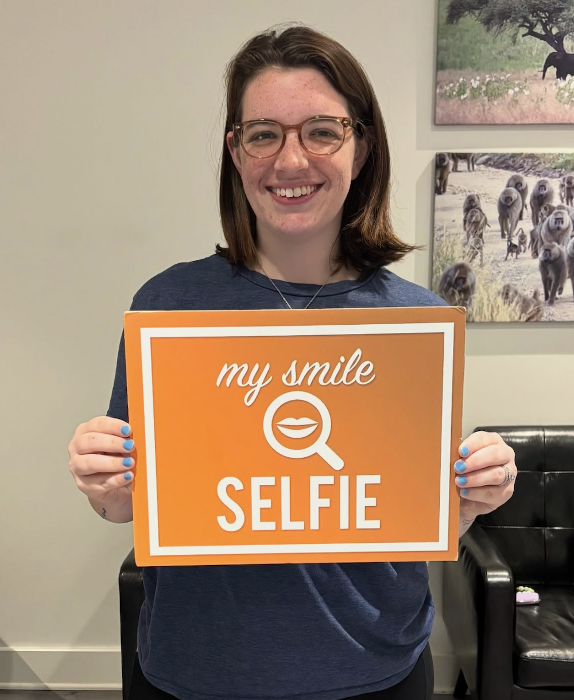 a happy patient at signature smiles in cary, nc