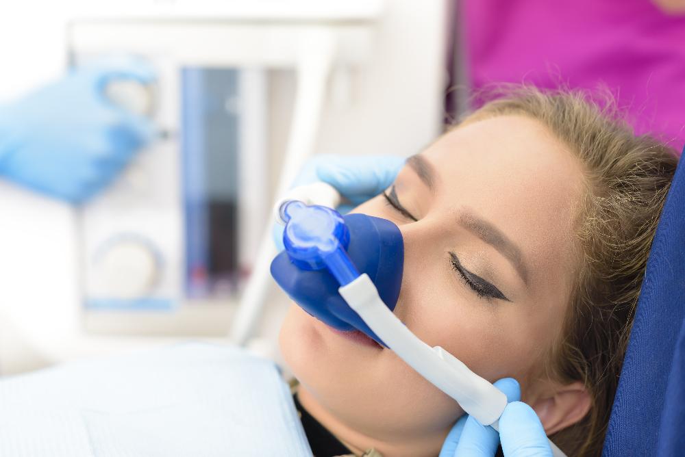 woman during sedation dentistry in cary nc